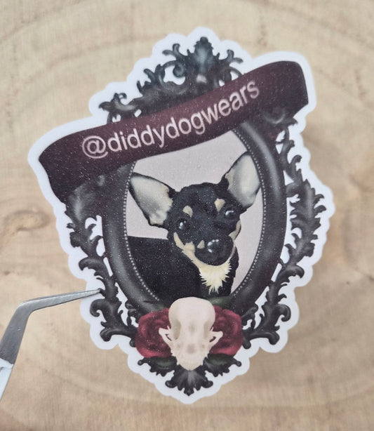 Sticker of a dog with a skull and decorative frame on a beige background
