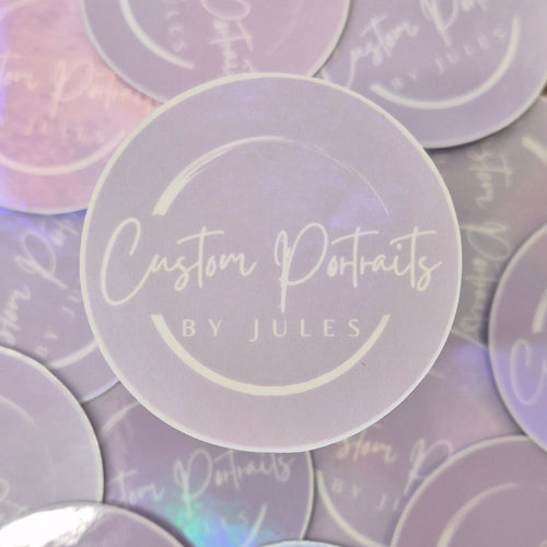 Iridescent stickers with 'Custom Portraits by Jules' text on a matching background